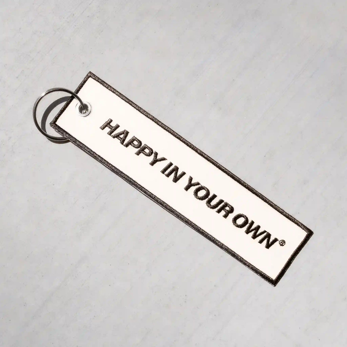 happy in your own keychain