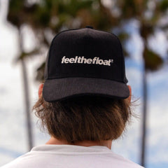 feel the float trucker hat